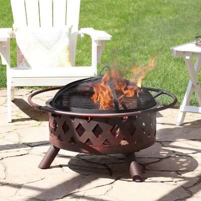 Sunnydaze Decor Sunnydaze Outdoor Camping Or Backyard Crossweave Cut Out Fire Pit With Spark Screen, Log Poker, And Metal Wood Grate - Bronze 3 Sunnydaze Decor Sunnydaze Outdoor Camping Or Backyard Crossweave Cut Out Fire Pit With Spark Screen, Log Poker, And Metal Wood Grate - Bronze