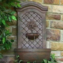 Sunnydaze Decor Sunnydaze 31"H Solar-Powered With Battery Pack Polystone Rosette Leaf Outdoor Wall-Mount Fountain